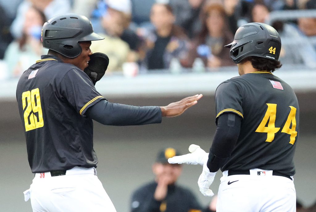 Mahki Backstrom celebrates Sean Roby Jr.'s home run (photo by Phil Hoops)