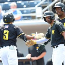 Sussex County Miners center fielder Edwin Mateo is congratulated by teammates after his second inning two-run home run on June 17, 2026 (photo by Phil Hoops).