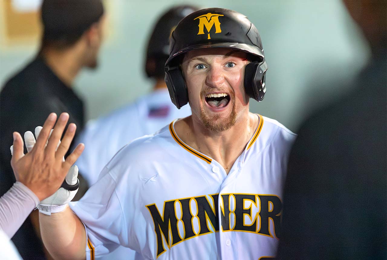 Sussex County Miners outfielder Keenan Taylor celebrates his home run with teammates (photo by Phil Hoops)
